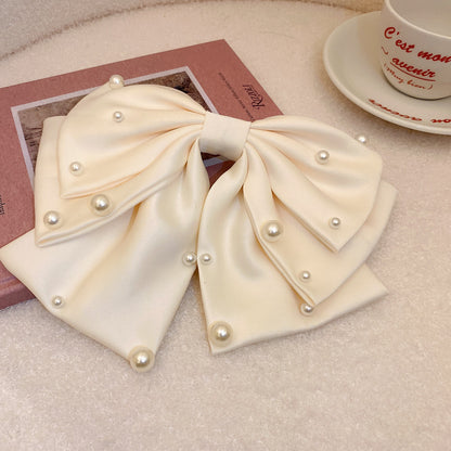LuxePearl™ Star Bow Hair Accessory