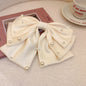 LuxePearl™ Star Bow Hair Accessory